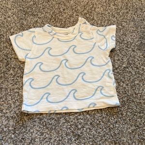 Monica and Andy wave top